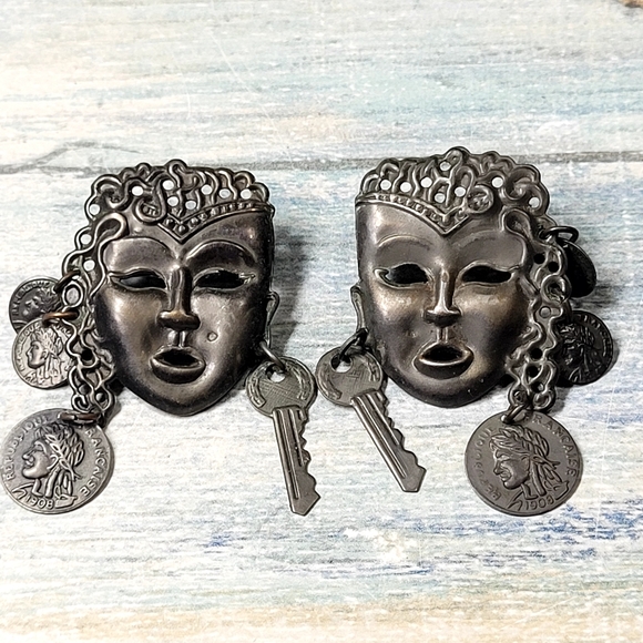 Unique Silver Metalic Mask Earrings with Key and Coin Accents - Picture 5 of 6